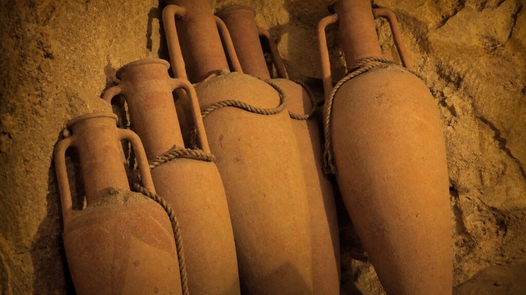 Ancient Greek amphorae in the perfume and wine workshop room in Athens